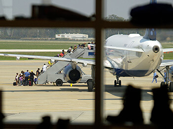 Michael Rieger/FEMA, Hurricane Katrina evacuees board an aircraft for evacuation at New Orleans airport where FEMA had set up operations, New Orleans, Louisiana, September 2, 2005. Michael Rieger/FEMA, Hurricane Katrina evacuees board an aircraft for evacuation at New Orleans airport where FEMA had set up operations, New Orleans, Louisiana, September 2, 2005.