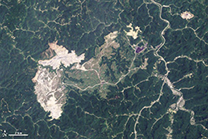Satellite imagery depicting the effects of mountaintop removal in Boone County, West Virginia, 2009.