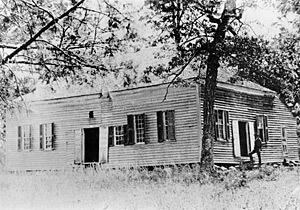 Waxhaw Presbyterian Church, Lancaster County, South Carolina. Built around 1800, it was the third meeting house of the congregation. This is the only known photograph of a meetinghouse the carvers themselves would have seen. Courtesy of Nancy Crockett.