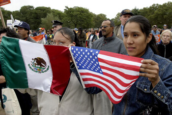 Stan Schnier, Women hold Mexican and American flags at the final Immigrant Workers Freedom Ride event, Flushing Meadows Corona Park, New York, New York, October 4, 2003. 
