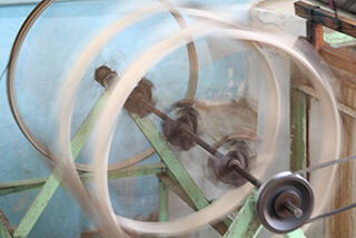 Mary E. Frederickson, Spinning silk thread, Margilan, Uzbekistan, 2006.
