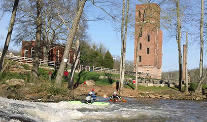 John Lane, Kayakers on the shore of Lawson's Fork, Spartanburg, South Carolina, 2007.