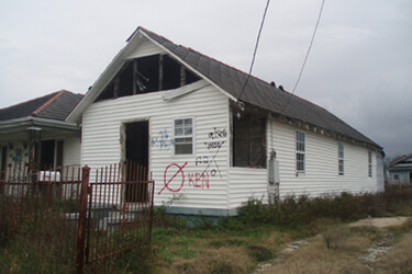 Dorothy Moye, Upper Ninth Ward house with "KEN" marking from private contractor, 2009. Dorothy Moye, Upper Ninth Ward house with "KEN" marking from private contractor, 2009.