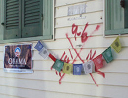 Dorothy Moye, Bywater neighborhood, Tibetan prayer flags and poster with preserved code, 2009. Dorothy Moye, Bywater neighborhood, Tibetan prayer flags and poster with preserved code, 2009.