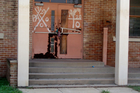 Dorothy Moye, Padlocked parochial school with water lines, Elysian Fields Avenue, 2008 Dorothy Moye, Padlocked parochial school with water lines, Elysian Fields Avenue, 2008