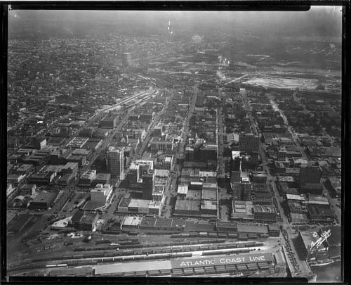 Burgert Brothers, Downtown Tampa aerial view, east from railroad sheds to Ybor, Estuary Zone, and gas storage tank Tampa, Florida, 1958. Catalog no.: PA 5858. Courtesy, Tampa-Hillsborough County Public Library System. Burgert Brothers, Downtown Tampa aerial view, east from railroad sheds to Ybor, Estuary Zone, and gas storage tank Tampa, Florida, 1958. Catalog no.: PA 5858.
