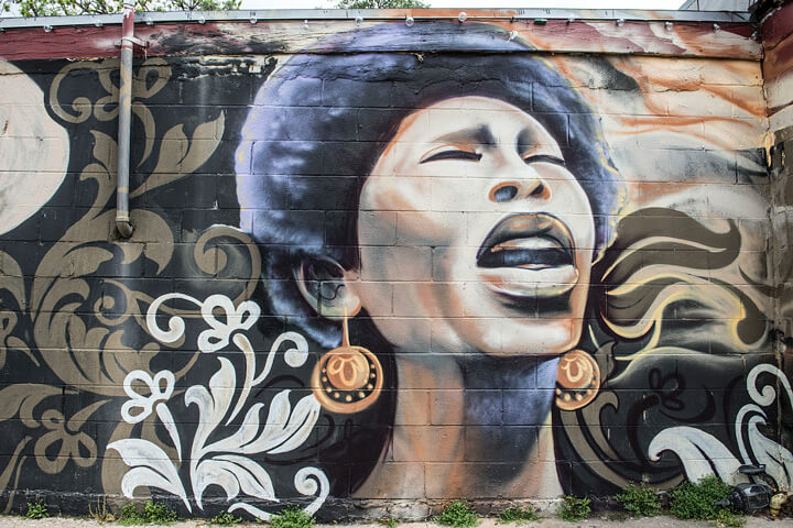 Mural on the wall of the Victory Grill, a longtime "Juke Joint" on 11th Street in East Austin. Painted by the Trust Your Struggle mural collective of soul musician Lavelle White. Photograph by Carol M. Highsmith. Courtesy of the Lyda Hill Texas Collection of Photographs in Carol M. Highsmith's America Project, Library of Congress, Prints and Photographs Division, LC-DIG-highsm-28220.