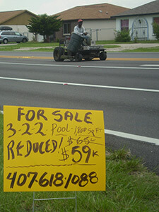 For Sale sign, Buenaventura Lakes, Florida, 2010. Photograph by Simone Delerme.