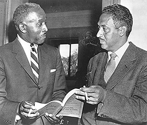 Louis R. Redding, left, of Wilmington, Del., and Thurgood Marshall, general counsel for NAACP, conferring at the Supreme Court during a recess in the court's hearing on racial integration in the public schools, Washington, D.C., 1955. Library of Congress, Prints and Photographs Division, LC-USZ62-117797.