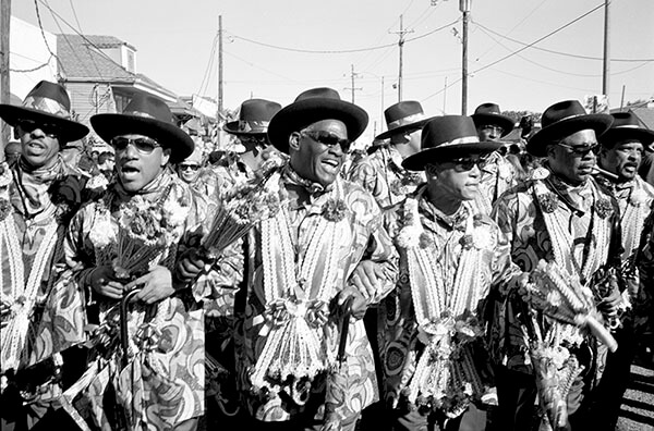 Lundi Gras second line, St. Claude Avenue. New Orleans, Louisiana, 2011. Photograph by Lewis Watts. Courtesy of Lewis Watts.