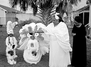 "To the Ancestors," Guardians of the Flame Arts Society, Harrison family home, Upper Ninth Ward. New Orleans, Louisiana, morning of Mardi Gras, 2007. Photograph by Lewis Watts. Courtesy of Lewis Watts.