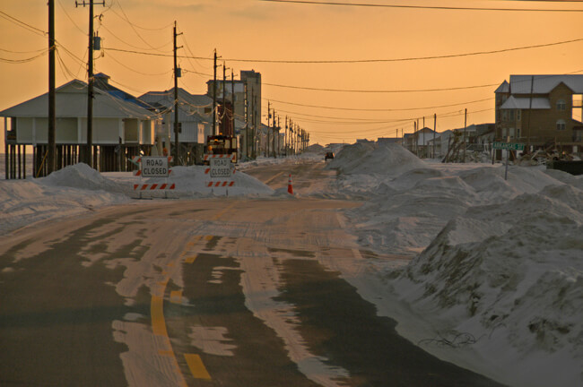 Marvin Nauman, Roads covered with sand, Navarre Beach, Florida, 2005, photograph courtesy of FEMA.