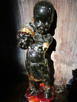 A child sculpture inside Kara Walker's A Subtlety, Brooklyn, New York, 2014. Photograph by Valérie Loichot. Courtesy of Valérie Loichot.