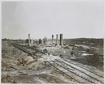 Aftermath of September 2, 1864, Confederate destruction of ammunition-laden railcars, near present-day Fulton Cotton Mill lofts, Atlanta, Georgia. Gelatin silver print by George Barnard. Courtesy of Library of Congress.