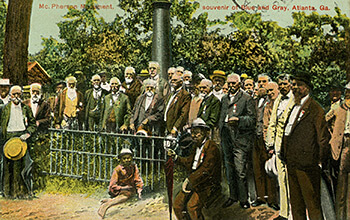 Blue-Gray reunion at the McPherson Monument, Albert Shaw, center-forward, with umbrella. July 1900. Illustration.