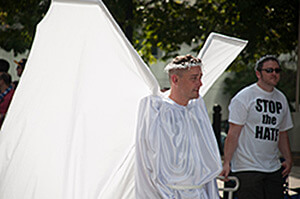 Stop the Hate. Bedsheet Angels march in the 2013 Atlanta Gay Pride Parade. Photograph by Nick Mickolas. Courtesy of Nick Mickolas. Stop the Hate. Bedsheet Angels march in the 2013 Atlanta Gay Pride Parade. Photograph by Nick Mickolas. Courtesy of Nick Mickolas.