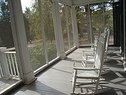 The porch at Andalusia, Flannery O'Connor's home in Milledgeville, Georgia. Photograph by pdoyen, November 12, 2008. Courtesy of pdoyen.
