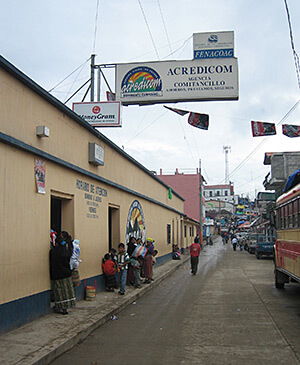 Family members collect remittances, Comitancillo, Guatemala, 2006. Photograph by Angela Stuesse. Courtesy of Angela Stuesse. Family members collect remittances, Comitancillo, Guatemala, 2006. Photograph by Angela Stuesse. Courtesy of Angela Stuesse.