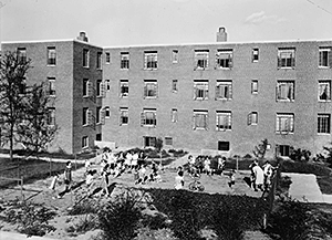View of playground behind Building X, from west facing east, Techwood Homes. Atlanta, Georgia, circa 1940. Photocopy of Photograph. Library of Congress Prints and Photographs Division, HABS GA,61-ATLA,60--16.