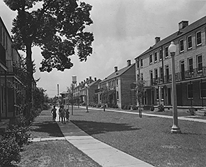 St. Thomas Street: the after photo. View shows completed St. Thomas Housing Project, circa 1940–1941. Photograph by US Housing Authority. National Archives and Records Administration, 196087.