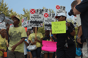Fair Development Campaign protest of Harbor Point development, Baltimore, Maryland, July 17, 2013. Photograph by Flickr user United Workers (CC BY 2.0).