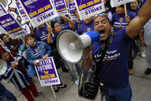 Houston janitors and supporters rally in downtown Houston on the first day of the janitors strike, Houston, Texas, October 23, 2006.