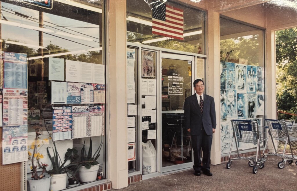 My grandfather, Đỗ Phương Anh, proudly standing in front of his family’s business, Bách Thảo Market in Nashville, after passing his citizenship test in 2000.