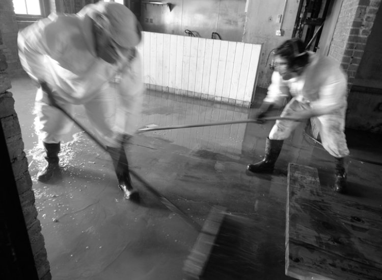 Pressure Washing and Sweeping Old Marshall Jail Hotel after Hurricane Helene.